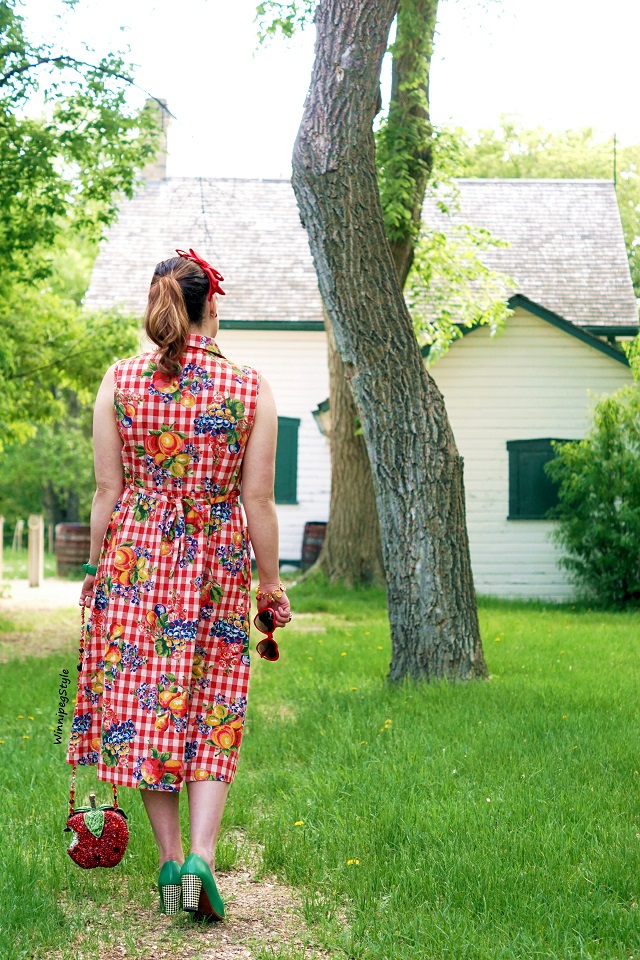 Winnipeg Style, Fashion Consultant, wardrobe stylist, Canadian fashion blog, April Cornell fruit basket porch dress, Midi length cotton dress, red gingham, Mary Frances first bite red apple beaded handbag purse clutch bag, Chie Mihara Oki green checkerboard heel pumps shoes, summer dress, country chic